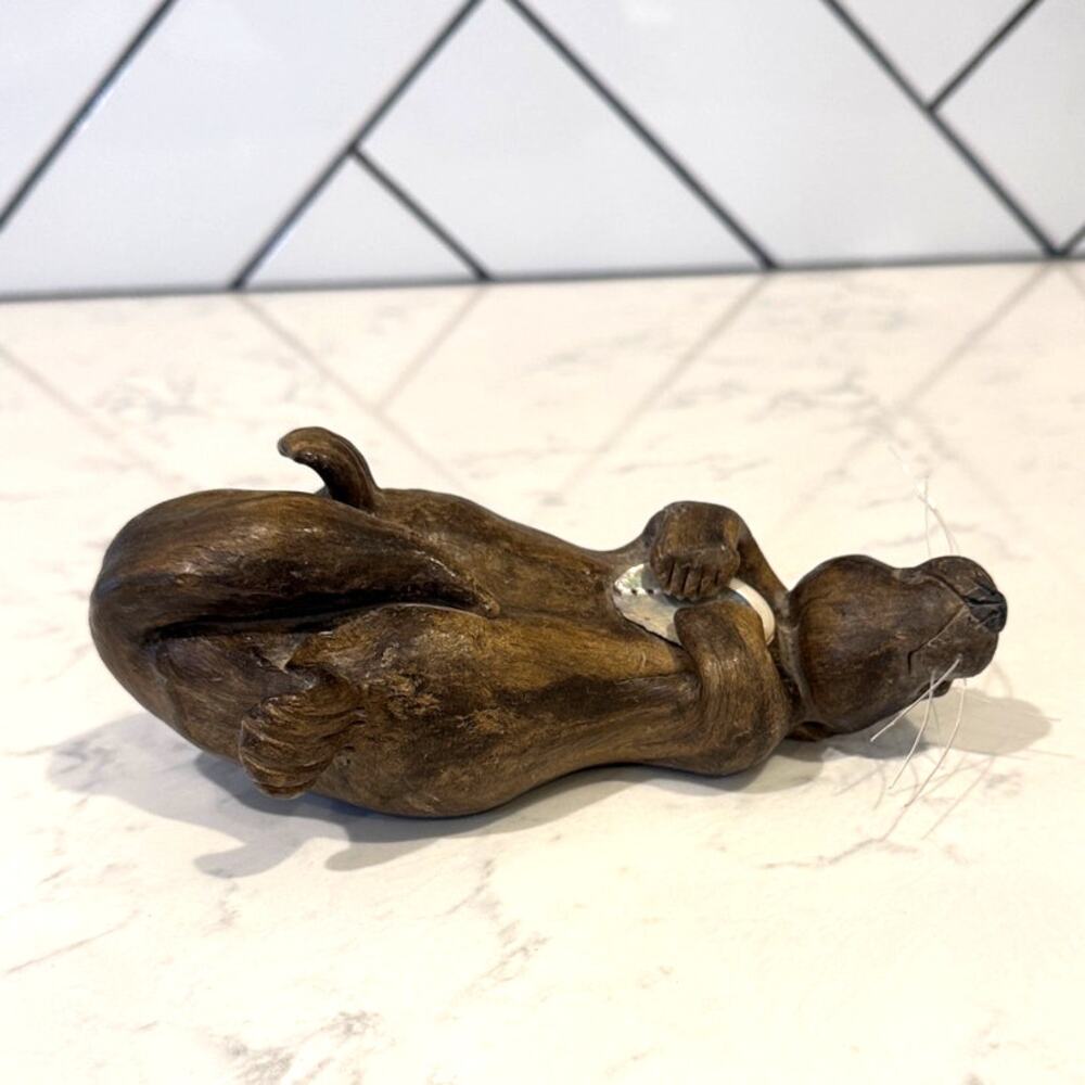 Vintage 70s handcrafted decorative wax sea otter holding an abalone shell